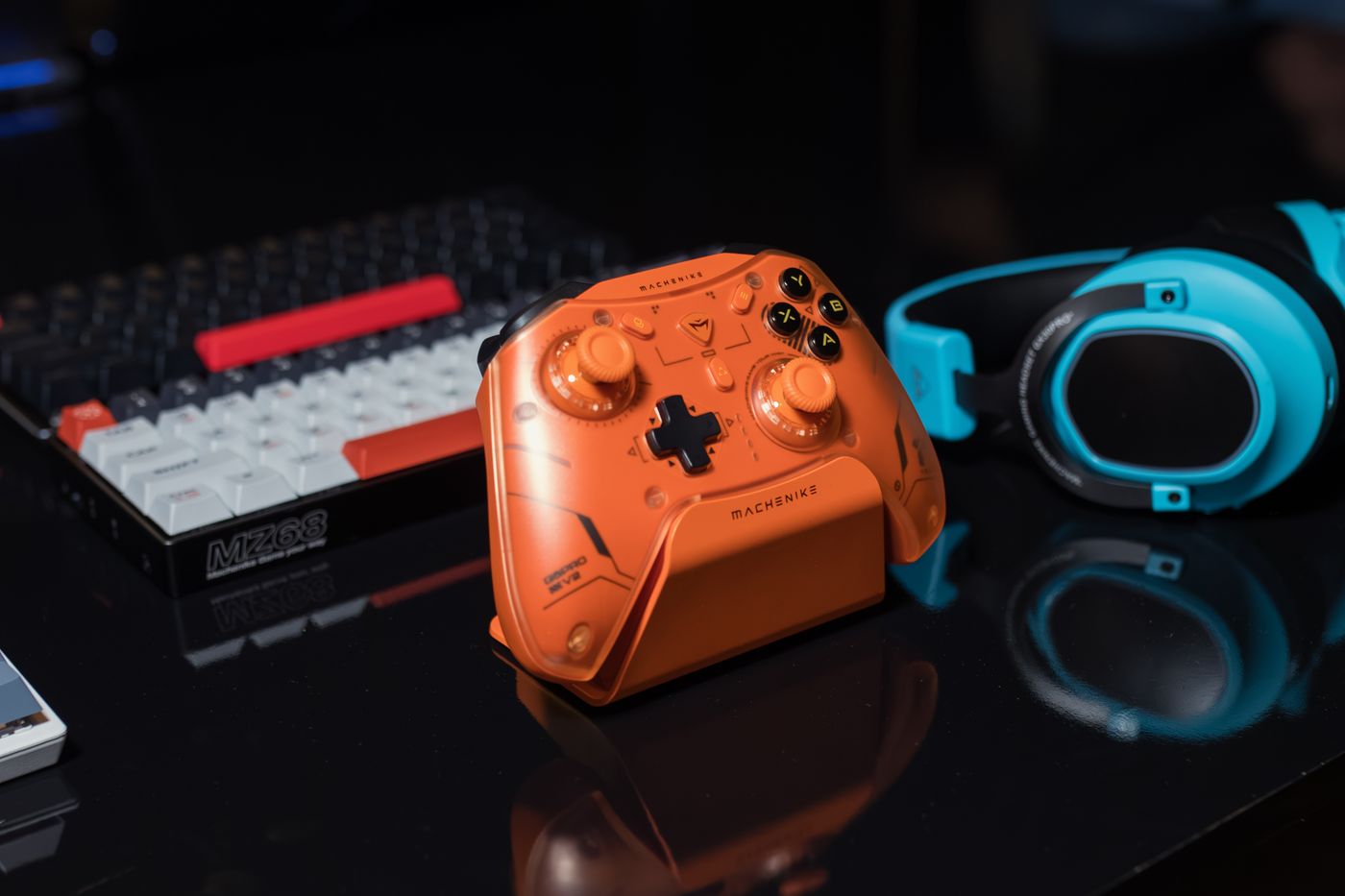 Purple-lit controller beside a keyboard